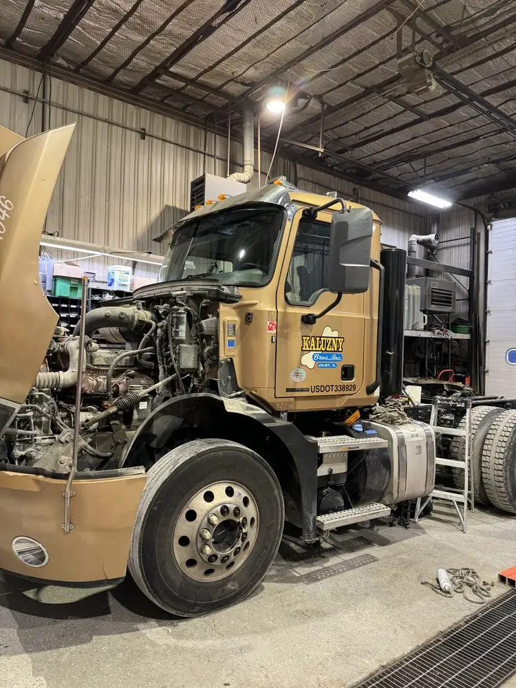 First Response Auto Glass replacing a semi truck windshield on-site